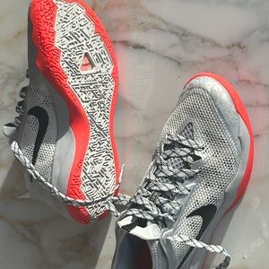 Women’s NikeSilver with Gray Blood Orange colored Trim Zoom Tennis Shoes